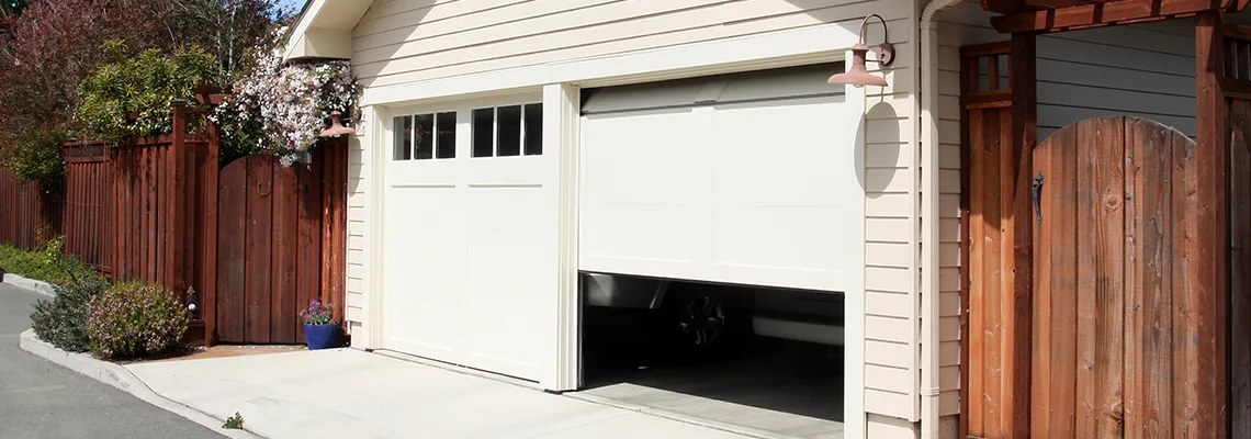 Fix Metal Garage Door Jerking in St. Charles, Illinois